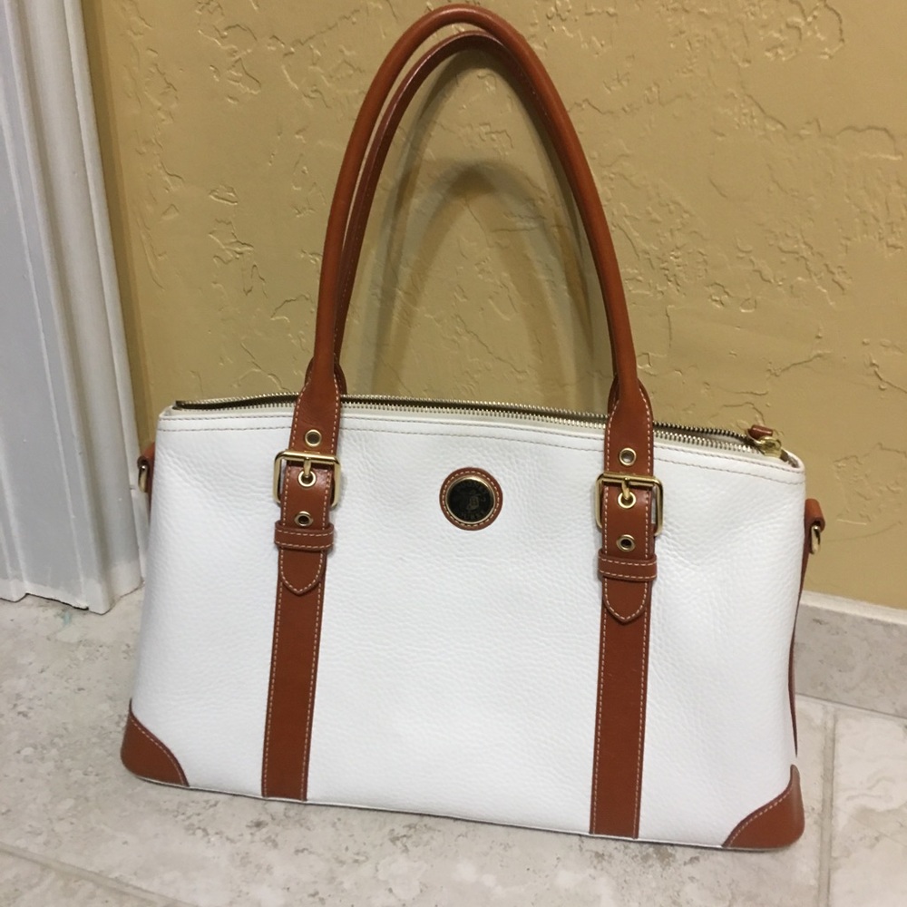 White and brown Dooney and Bourke purse